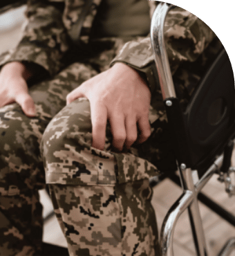 a soldier sitting on a wheelchair