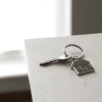 Key on house-shaped keychain