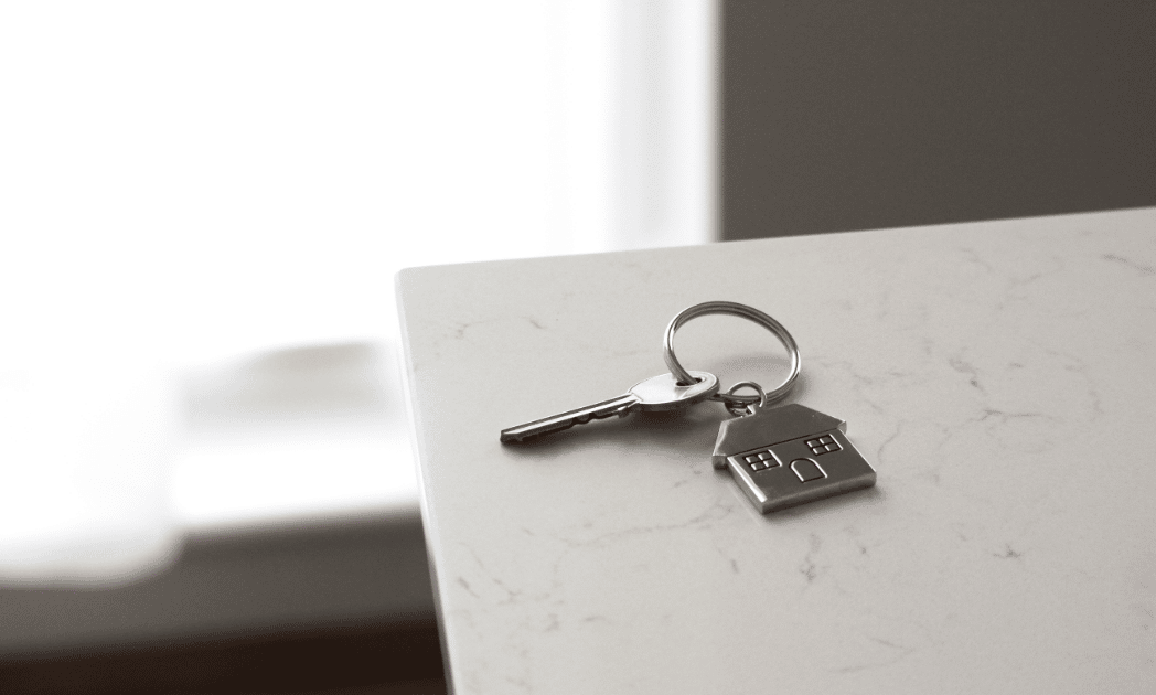 Key on house-shaped keychain