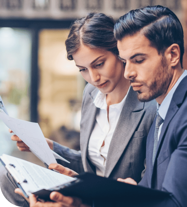 two lawyers reviewing documents