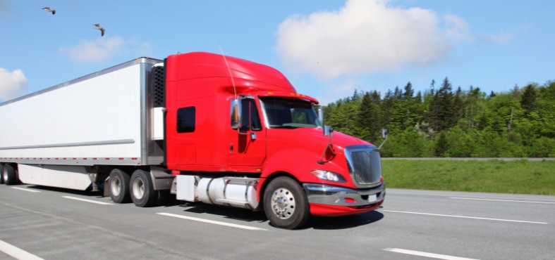 a semi truck driving in Houston