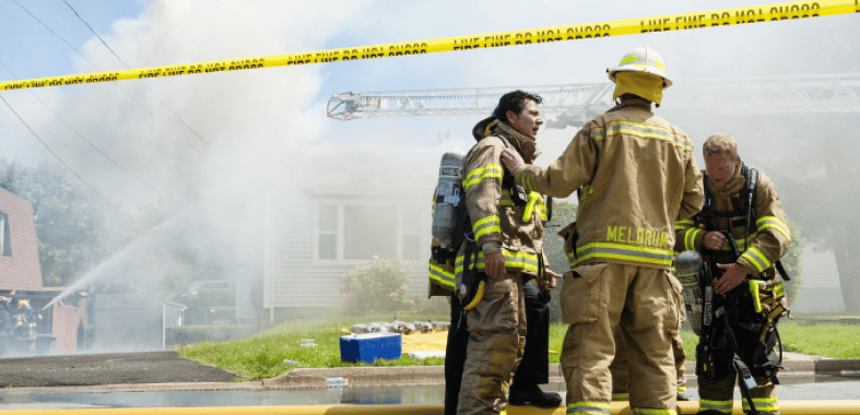 fire fighters at the scene of a fire