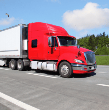 a semi truck driving in Houston