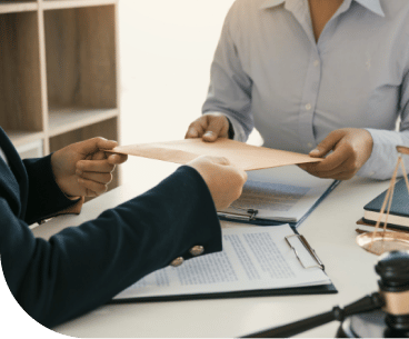 a lawyer handing a person an envelope