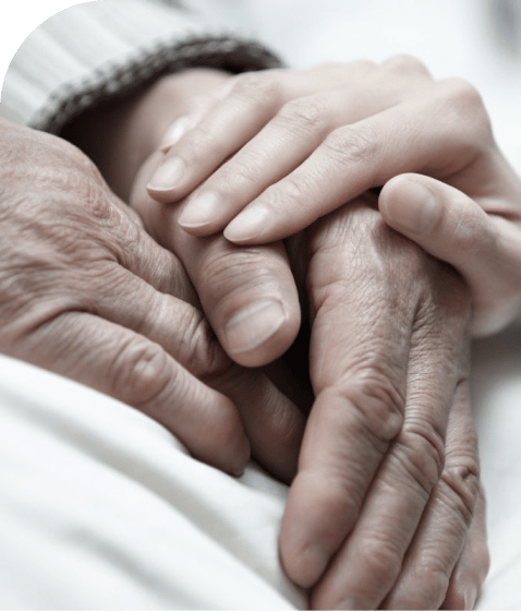 an older couple holding hands