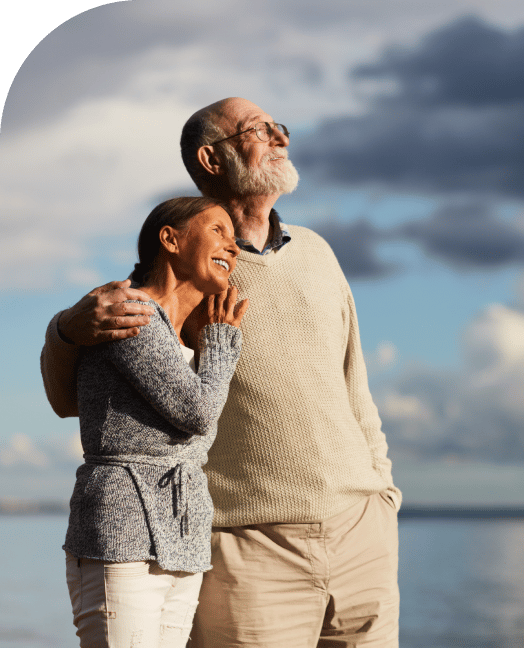 a veteran watching the sunset with his wife