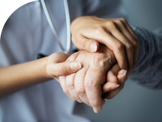 a doctor holding a veterans hand