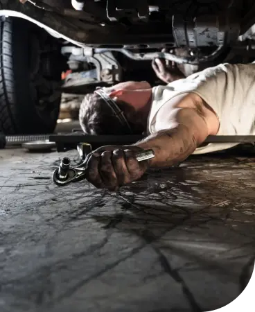 Mechanic working on a vehicle