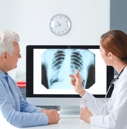 doctor and patient looking at x-ray
