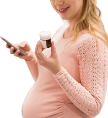 pregnant woman reading drug prescription