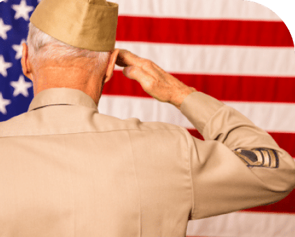 veteran saluting American flag