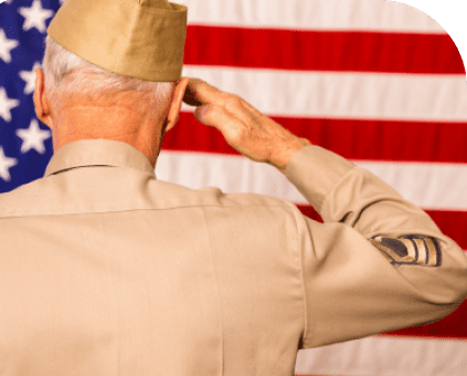 veteran saluting American flag