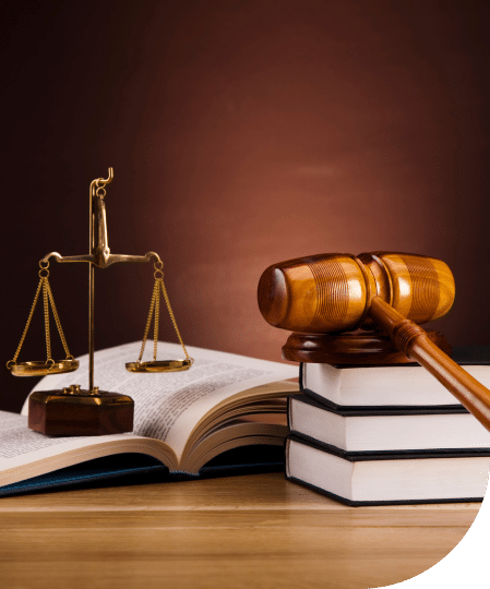 gavel, scales, and law books on a desk