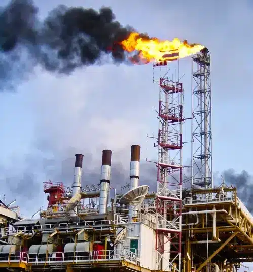 Texas oil refinery with smoke and pollution