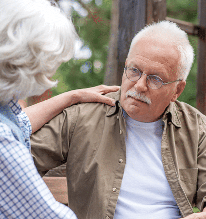 Senior couple talking about a Cancer diagnosis