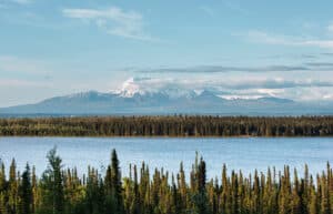 Picturesque mountains of Alaska in summer. Snow covered massifs, glaciers and rocky peaks.