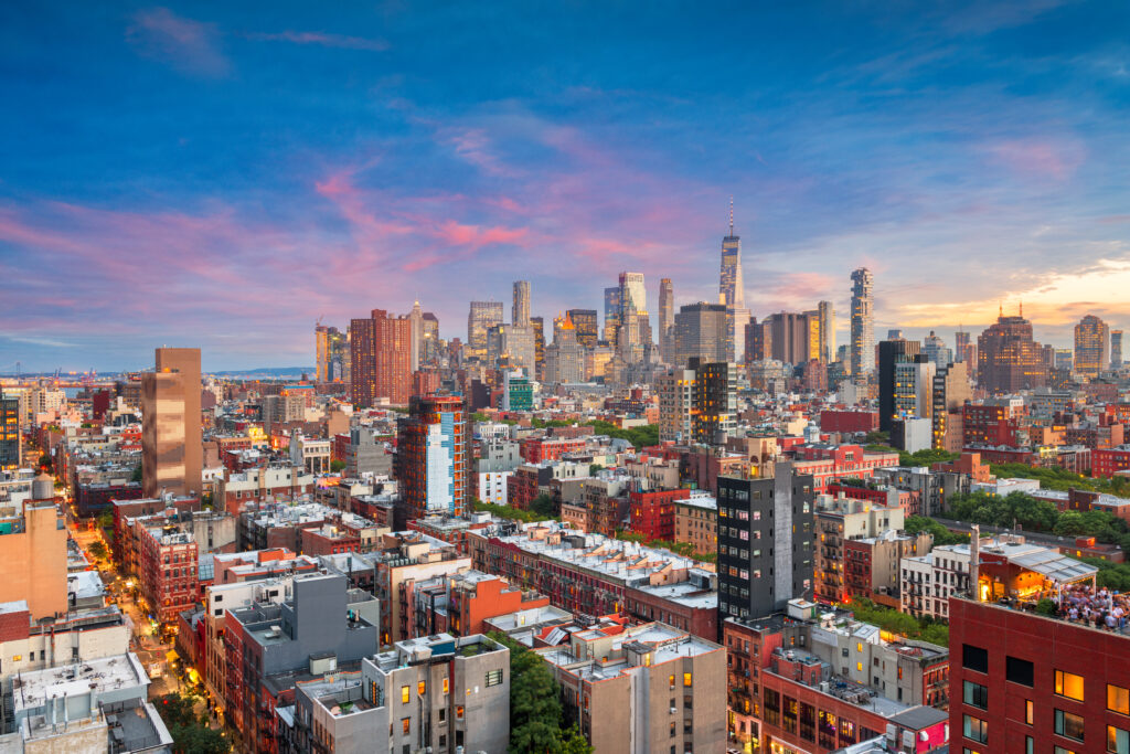 New York, New York, USA Lower Manhattan city skyline rooftop view at dusk.
