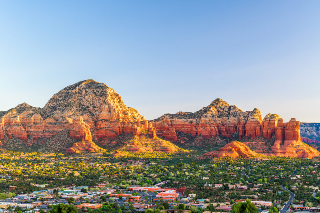 Sedona, Arizona, USA downtown cityscape and mountains.