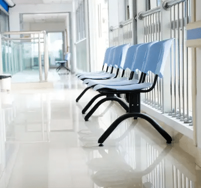 Floors in a hospital with chairs in a waiting room