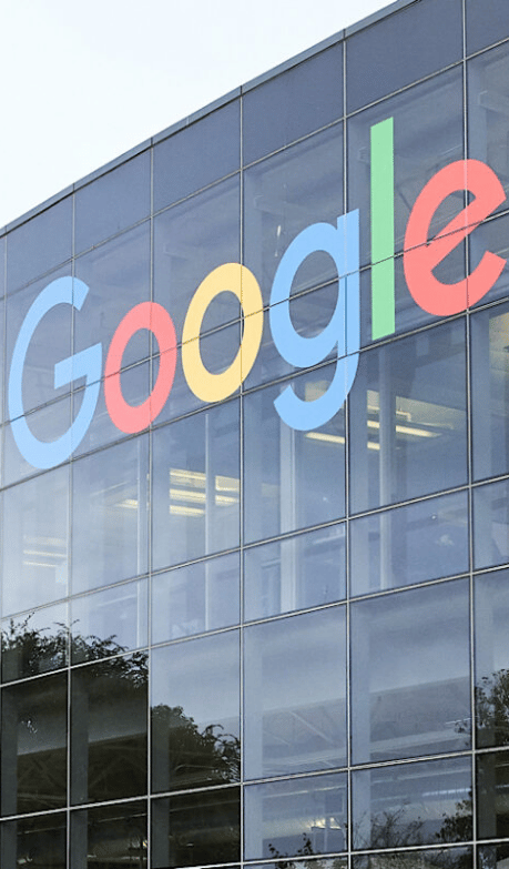 Google sign on a glass building