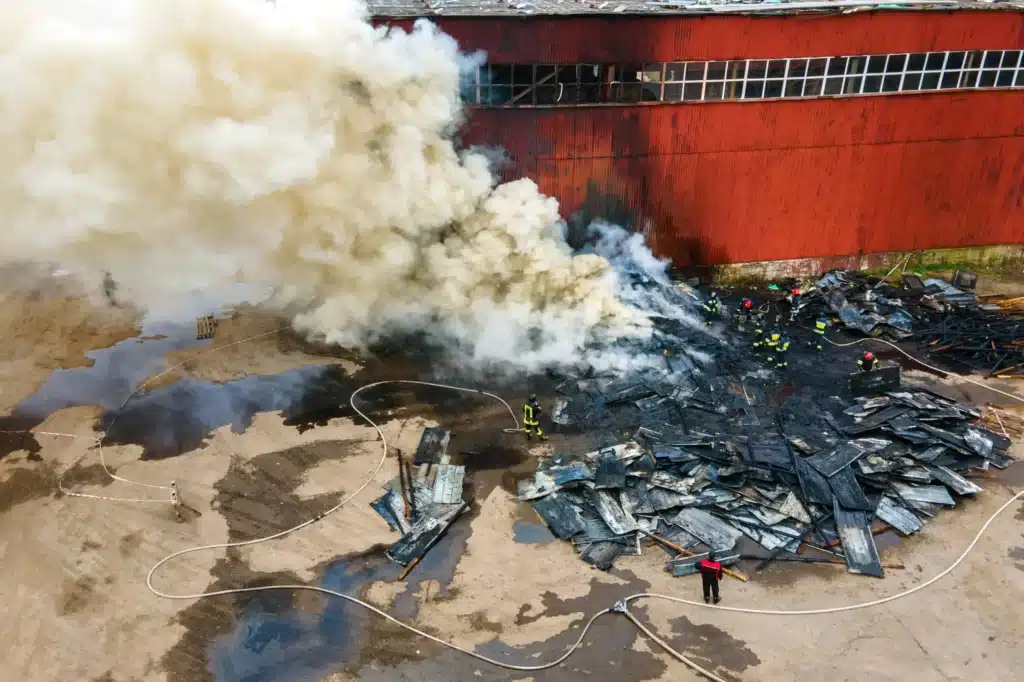 Areal view of firemen controlling a fire after an industrial accident in Texas