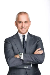 Photo of Evan Janush with arms crossed