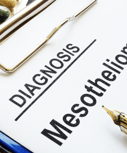 Photo of a paper that reads "diagnosis: mesothelioma"