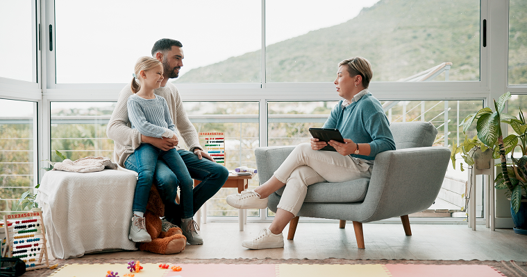 Dad with daughter and therapist