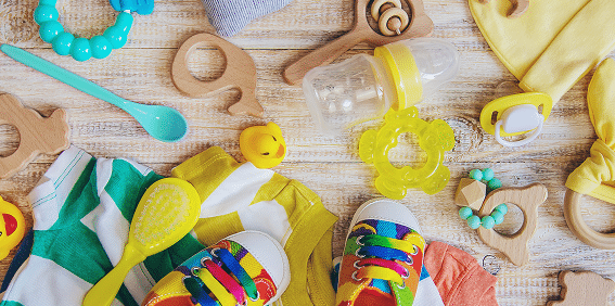 Colorful kid's products and toys on a wooden table