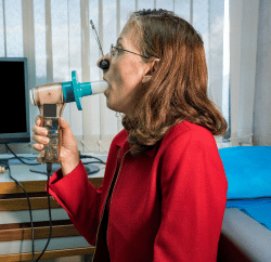 Patient Receiving a Pulmonary Function Test For Asbestos-Related Illness