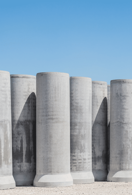 Cluster of Large Asbestos-Containing Cement Pipes for Construction