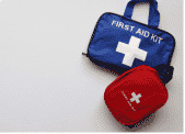 Two bags, one with a plus sign and another with the words "first aid kit"