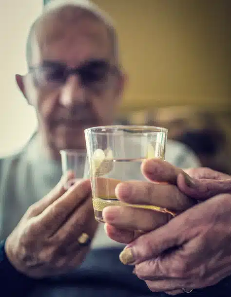 Caregiver Assisting Mesothelioma Patient