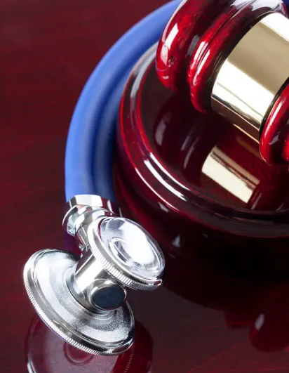 Stethoscope and gavel as a symbol of personal injury