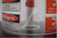 Magnified Image of Vial of Raw Asbestos Sealed in Container