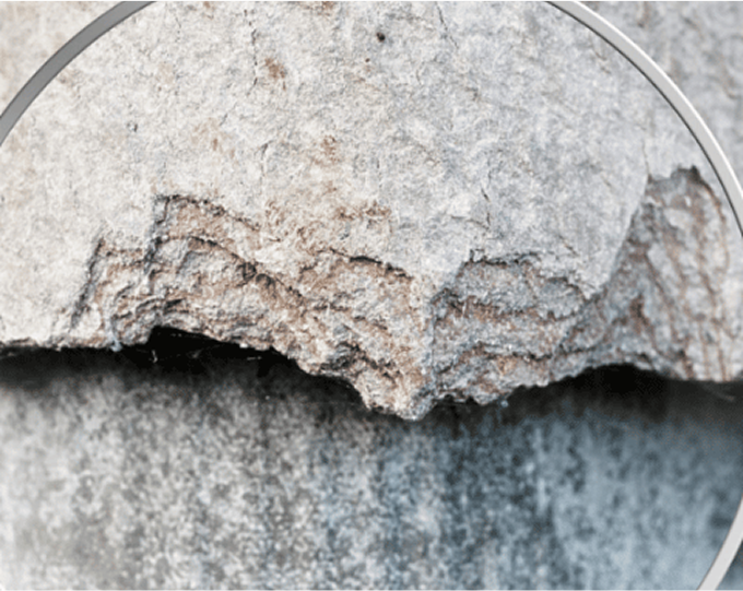 Asbestos under magnifying glass