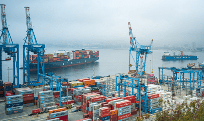 Busy port with cargo ships and cargo containers
