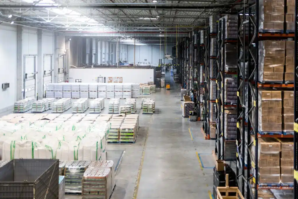 Huge distribution Texas warehouse with high shelves, viewed from above