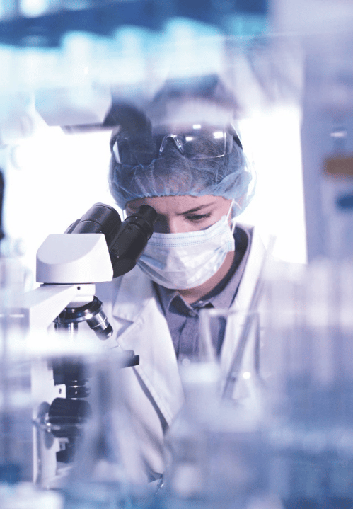 Female doctor with microscope