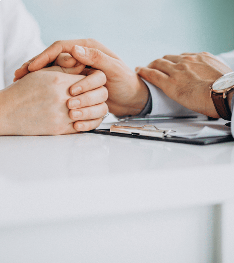 Consoling hand on top of another