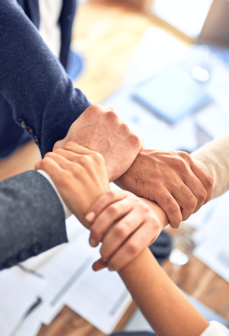 Hands interlaced making a chair