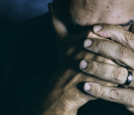 Man with hands in his head