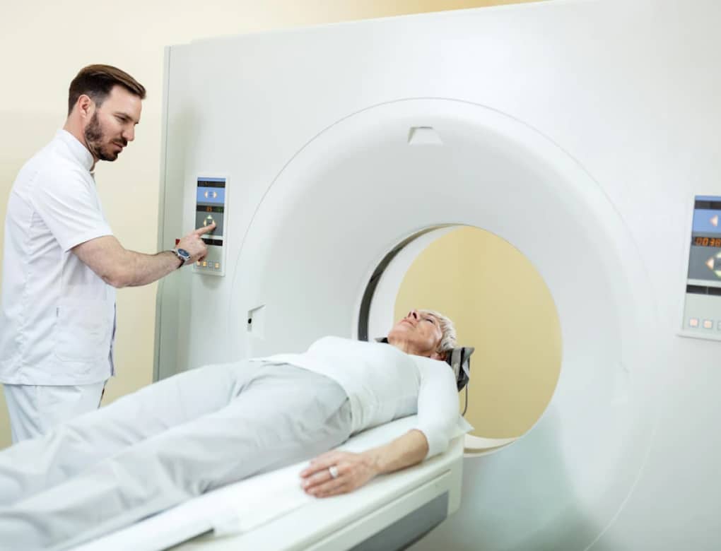 MRI machine with doctor and patient