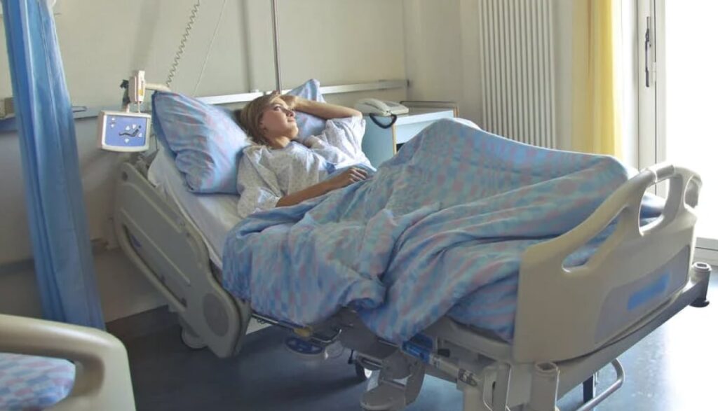 Patient in hospital bed