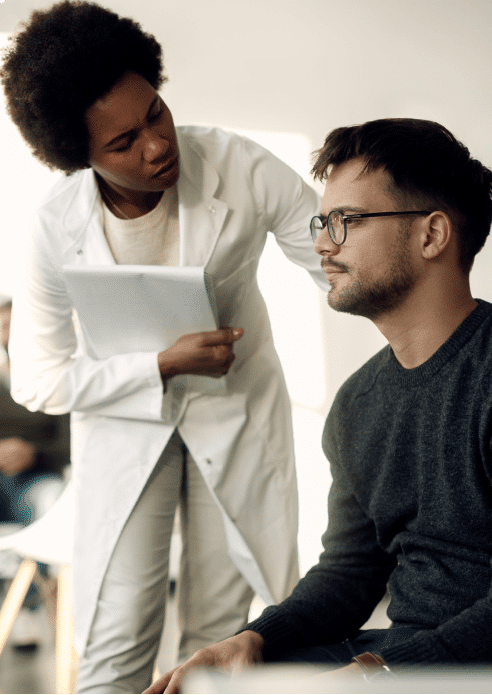 Female doctor and male patient