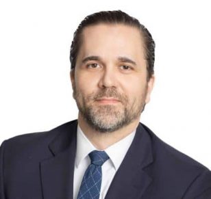 Headshot of Julian Cokic, Lanier Law Firm Senior Attorney in the Business Litigation practice.